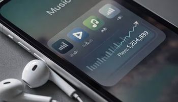 Image showing rising music streaming play counts on a smartphone