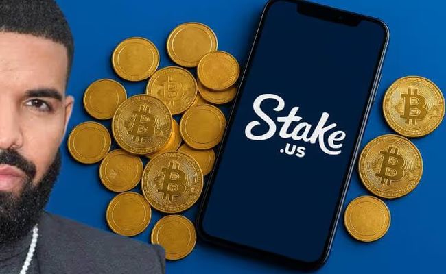 Partial image of Drake, a smartphone showing the Stake.us logo surrounded by Bitcoin and gold coins on a blue background, representing the Drake sued over Stake lawsuit.