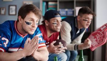 close up three fans wearing sports clothes (1)